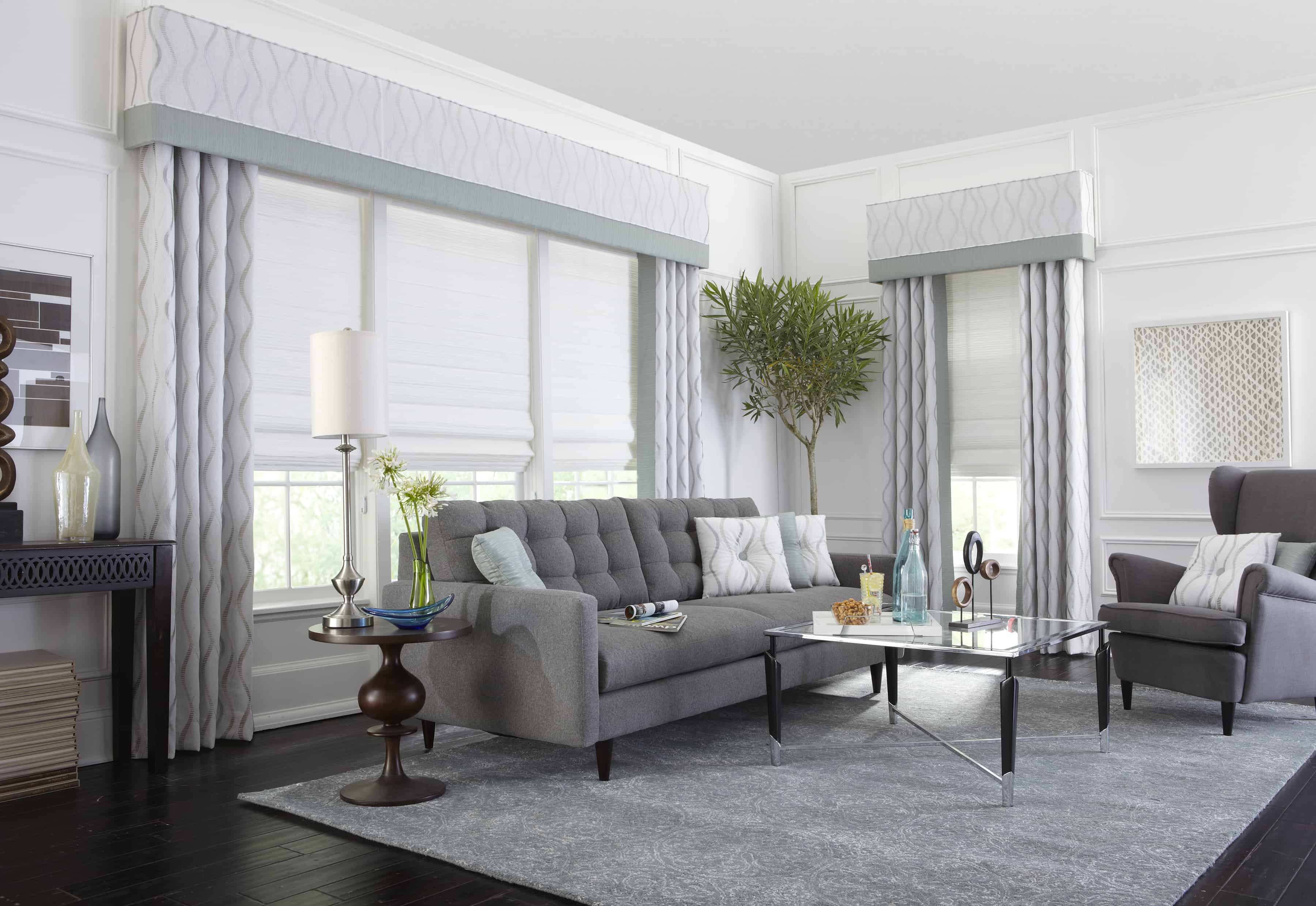 gray sofa and draperies in living room